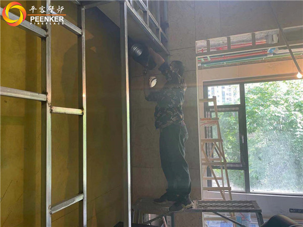 陜西西安曲江華著中城丹麥Aduro A5真火壁爐安裝.jpg