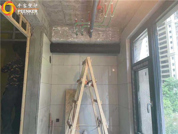 陜西西安曲江華著中城丹麥Aduro A5真火壁爐安裝.jpg